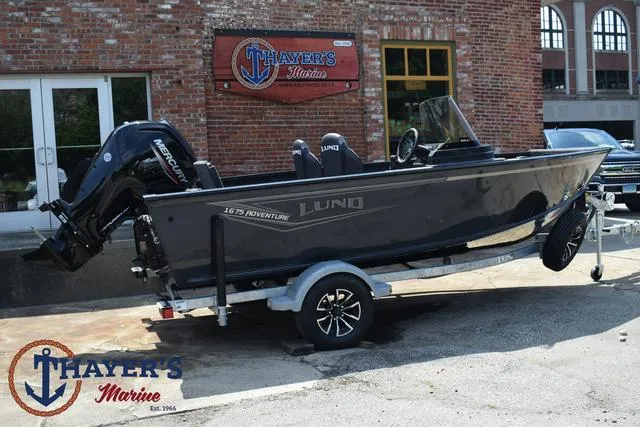 Slide: The Image of 2025 Lund 1675 Adventure SS boat on trailer at Thayer's Marine dealership. - 3