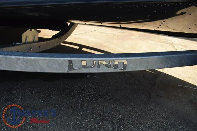 Slide: The Image of Lund 1675 Adventure SS 2025 boat trailer close-up with logo. - 5