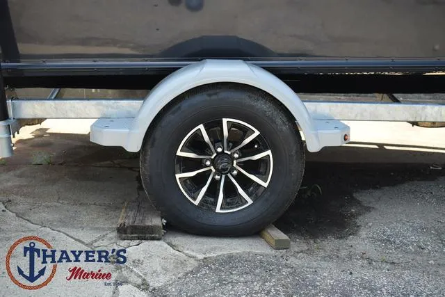 Slide: The Image of 2025 Lund 1675 Adventure SS trailer wheel at Thayer's Marine. - 6