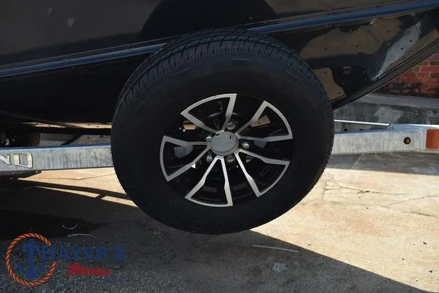 Slide: The Image of 2025 Lund 1675 Adventure SS boat trailer wheel close-up. - 7