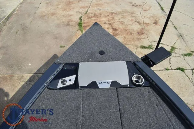 Slide: The Image of Top view of 2025 Lund 1875 Pro-V Bass XS boat deck with storage compartments. - 13