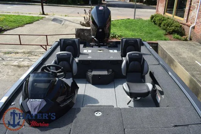 Slide: The Image of 2025 Lund 1875 Pro-V Bass XS boat interior with seating and console. - 21