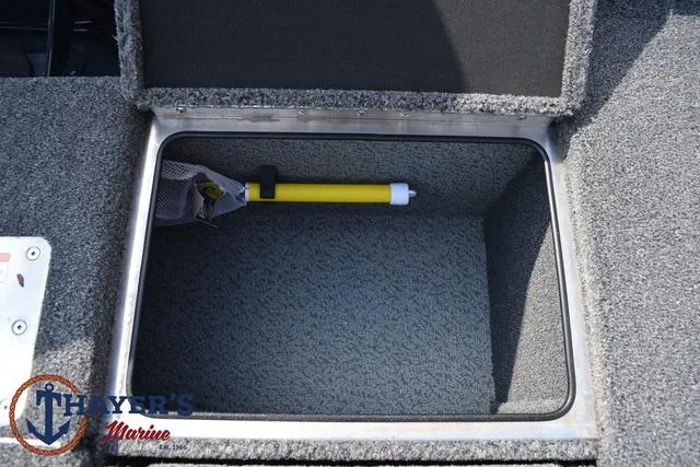 Slide: The Image of Open storage compartment in 2025 Lund 1875 Pro-V Bass XS boat. - 39