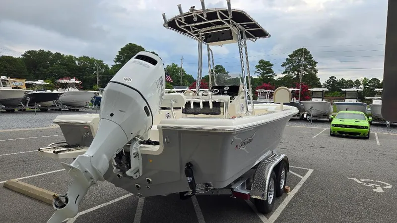 Slide: The Image of 2025 Bulls Bay 2200 boat on trailer in parking lot. - 4