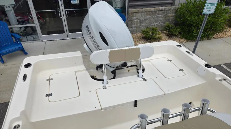 Slide: The Image of 2025 Bulls Bay 2200 boat with outboard motor and seating area. - 8