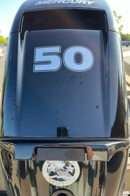 Slide: The Image of 2024 Tracker Grizzly 1648 SC with Mercury 50 horsepower outboard motor. - 4