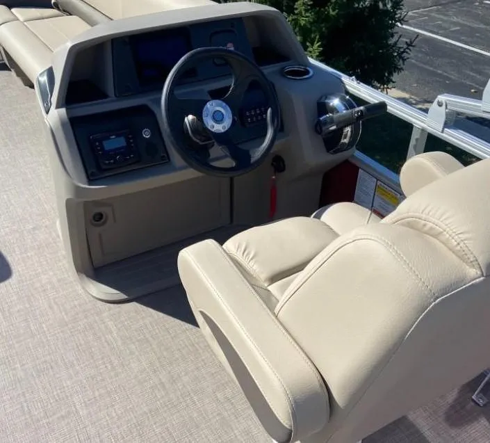 Slide: The Image of Captain's chair and helm of 2024 Sun Tracker Party Barge 18 DLX pontoon boat. - 4