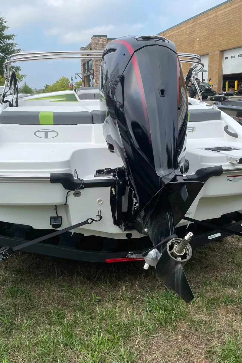 Slide: The Image of 2024 Tahoe T18 boat with outboard motor, rear view. - 4