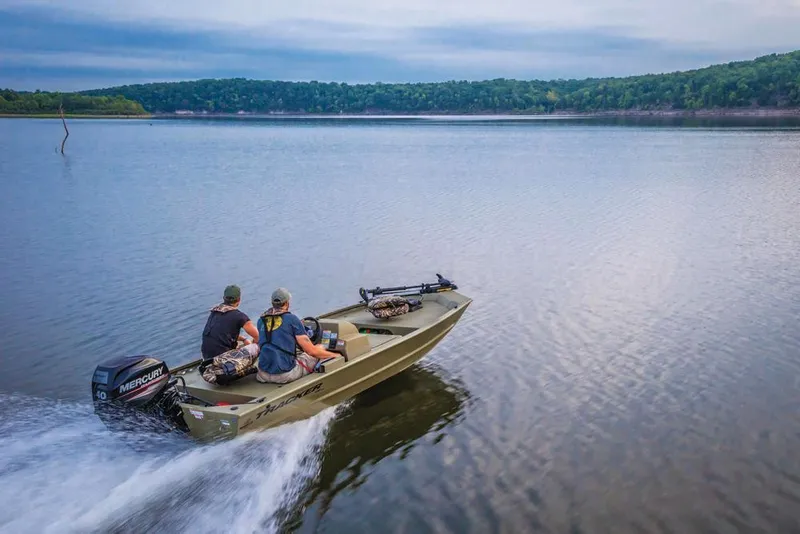 Slide: The Image of 2024 Tracker Grizzly 1648 SC boat storage compartment, open and empty. - 5
