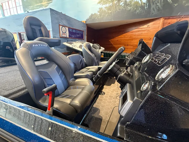 Slide: The Image of 2024 Nitro Z20 boat interior with sleek seats and modern dashboard design. - 3