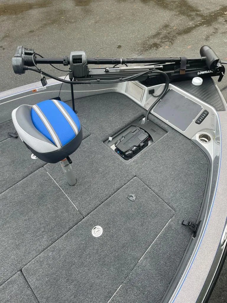 Slide: The Image of 2024 Ranger 621FS Pro boat deck with seat and trolling motor. - 2