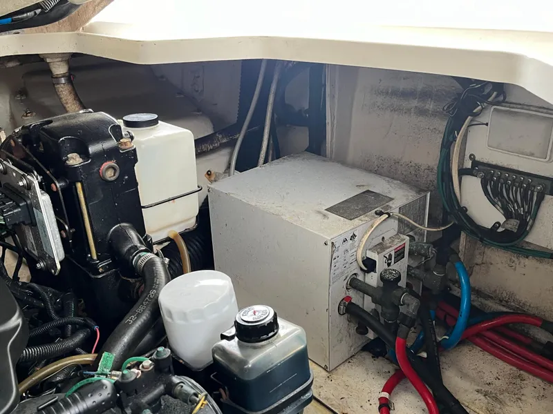 Slide: The Image of Engine compartment of a 2006 Sea Ray 260 Sundancer boat. - 45