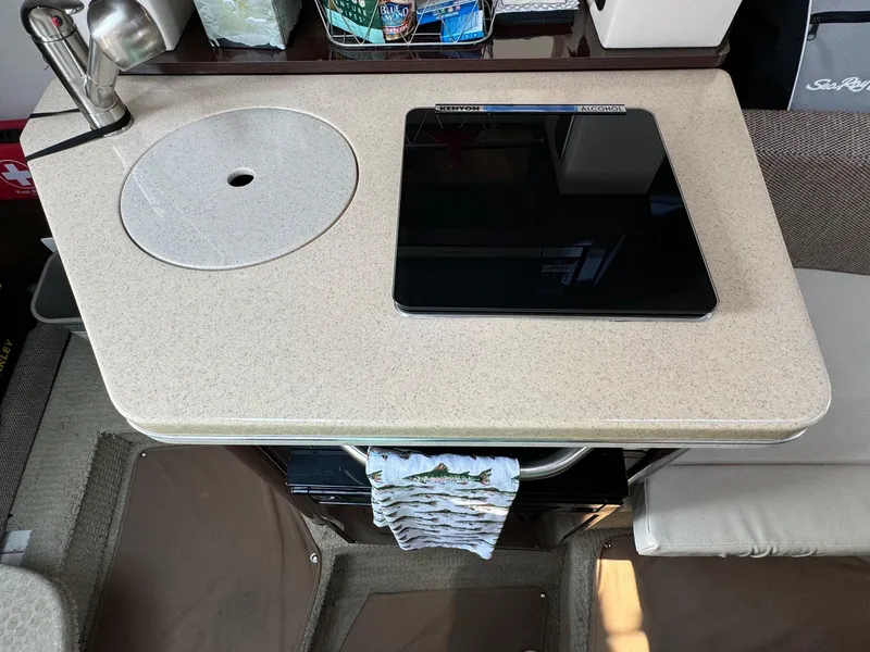 Slide: The Image of 2018 Sea Ray Sundancer 260 interior with countertop and tablet. - 35