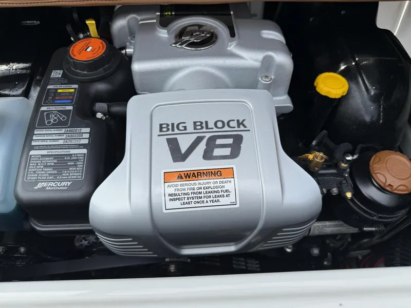 Slide: The Image of Big Block V8 engine in 2025 Crownline 290 SS boat, showcasing power and performance. - 8