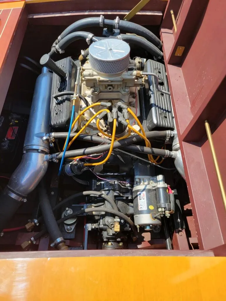 Slide: The Image of 1951 Chris-Craft Riviera 16 engine compartment with visible components and wiring. - 12