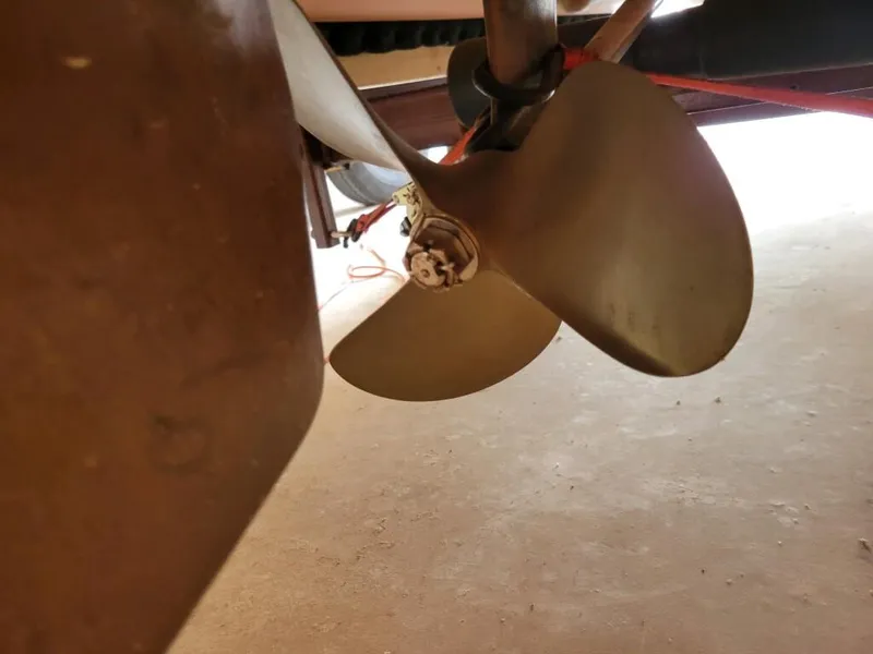 Slide: The Image of 1951 Chris-Craft Riviera 16 boat propeller close-up. - 13