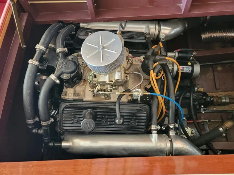 Slide: The Image of 1951 Chris-Craft Riviera 16 engine compartment with visible components and wiring. - 8