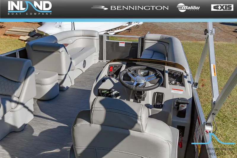 Slide: The Image of 2023 Bennington 22 SL pontoon boat interior with steering console and seating. - 11