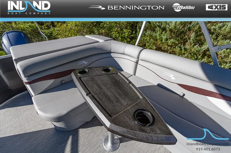 Slide: The Image of 2023 Bennington 22 SL boat interior with seating and table. - 14