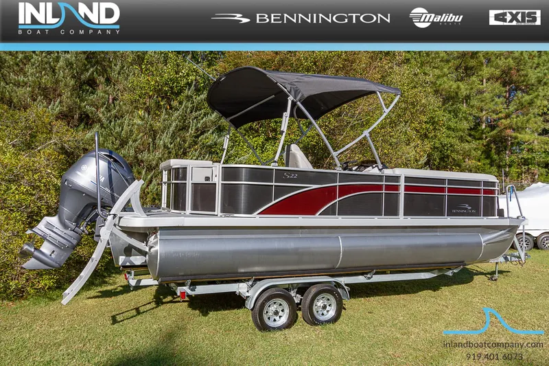 Slide: The Image of 2023 Bennington 22 SL pontoon boat on trailer with canopy. - 3