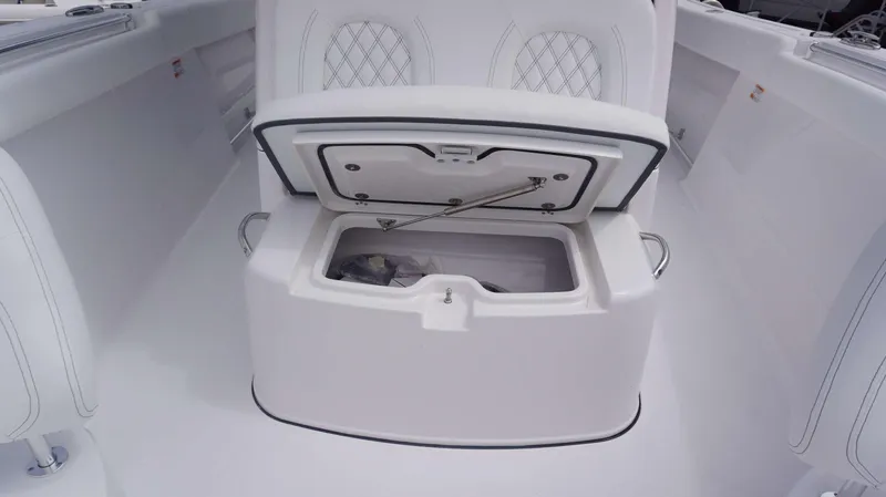 Slide: The Image of 2025 Sportsman 302 OPEN boat with open storage compartment. - 10