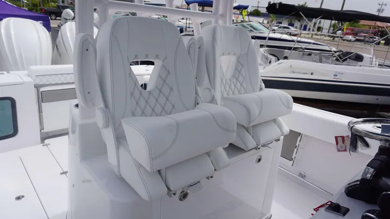 Slide: The Image of Luxury seating on the 2025 Sportsman 302 OPEN boat model. - 12
