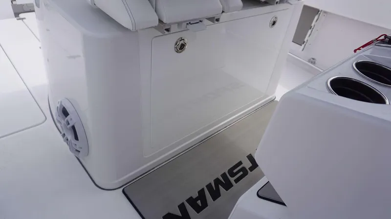 Slide: The Image of 2025 Sportsman 302 OPEN boat interior with seating and cup holders. - 13