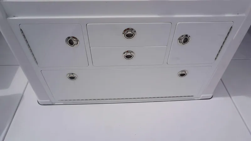 Slide: The Image of Storage compartments on the 2025 Sportsman 302 OPEN boat. - 19