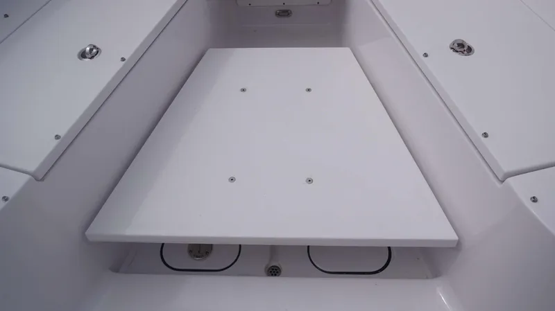 Slide: The Image of 2025 Sportsman 302 OPEN boat deck with storage compartments. - 7