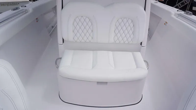 Slide: The Image of White cushioned seating on the 2025 Sportsman 302 OPEN boat. - 9