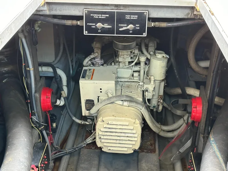 Slide: The Image of Engine compartment of a 1986 Sea Ray 390 Express Cruiser. - 28