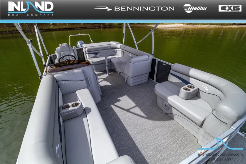 Slide: The Image of 2023 Bennington 20 SLM pontoon boat interior with spacious seating and cup holders. - 17