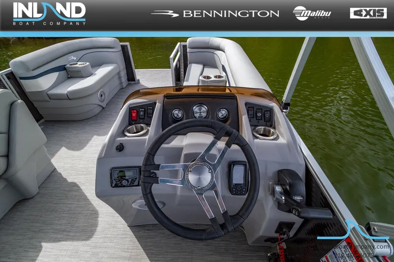Slide: The Image of 2023 Bennington 20 SLM boat interior with steering wheel and seating. - 9