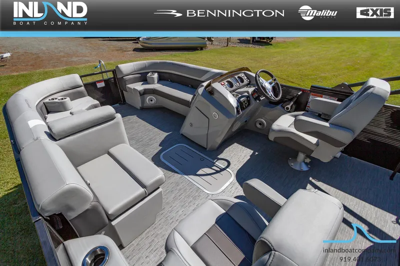 Slide: The Image of 2023 Bennington 22 SXSB pontoon boat interior with luxurious seating and modern dashboard. - 15