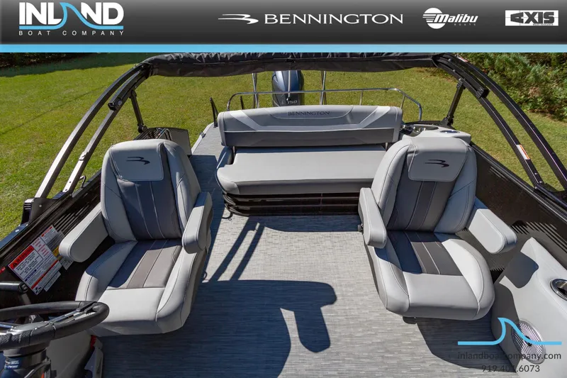 Slide: The Image of 2023 Bennington 22 SXSB boat interior with gray seating and spacious layout. - 17