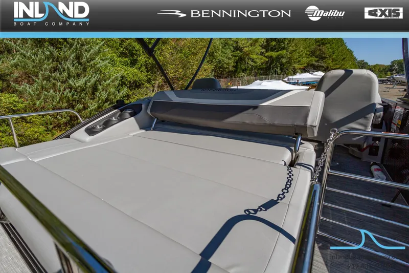 Slide: The Image of 2023 Bennington 22 SXSB boat with spacious sun deck and comfortable seating. - 24