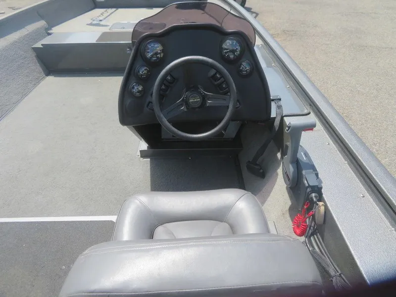 Slide: The Image of 2019 War Eagle 2170 boat interior with steering console and seating. - 4