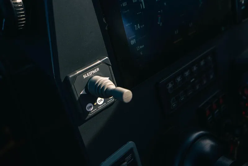 Slide: The Image of Close-up of 2024 Onda Magna control panel with lever switch. - 23