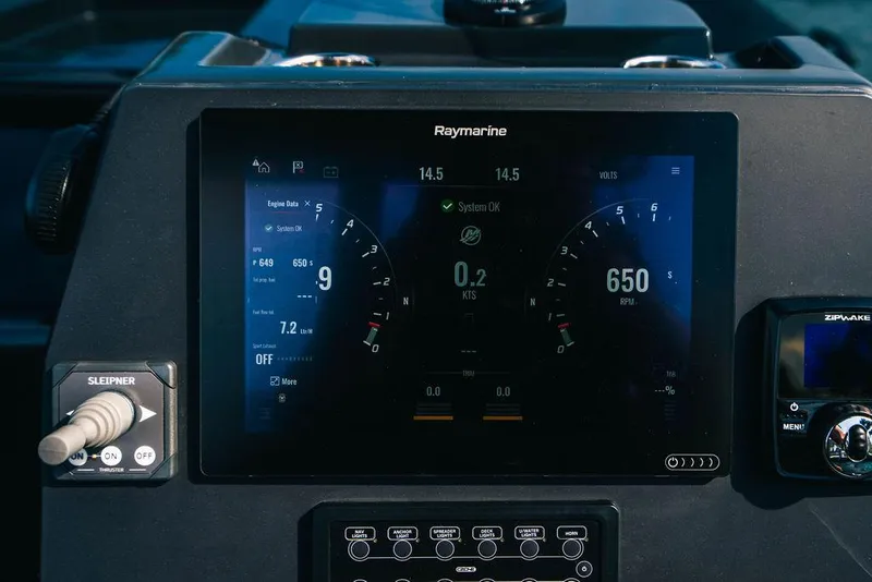 Slide: The Image of Dashboard of 2024 Onda Magna boat with Raymarine display showing engine data. - 22