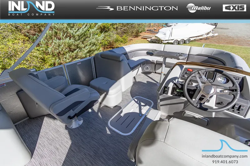 Slide: The Image of 2023 Bennington 22 SXSR pontoon boat interior with helm and seating. - 11