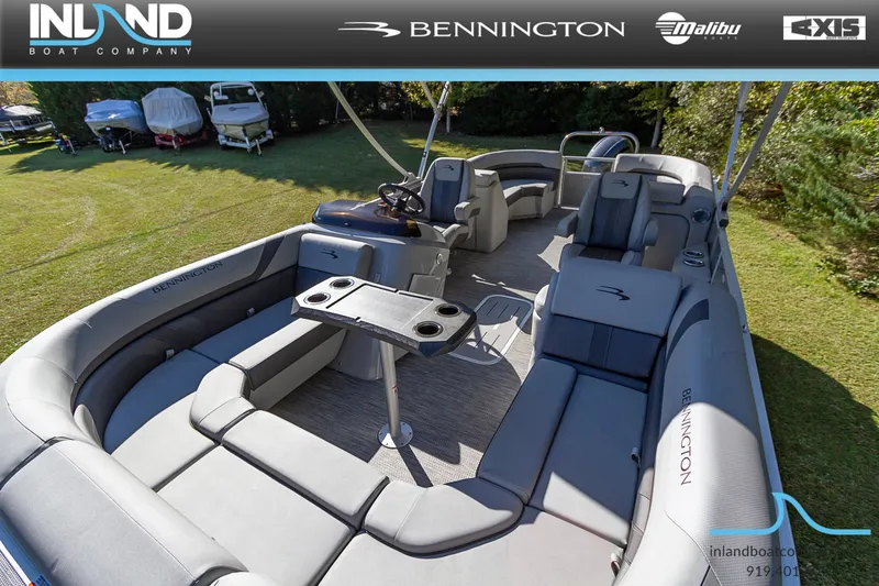 Slide: The Image of 2023 Bennington 22 SXSR pontoon boat interior with spacious seating and table. - 16