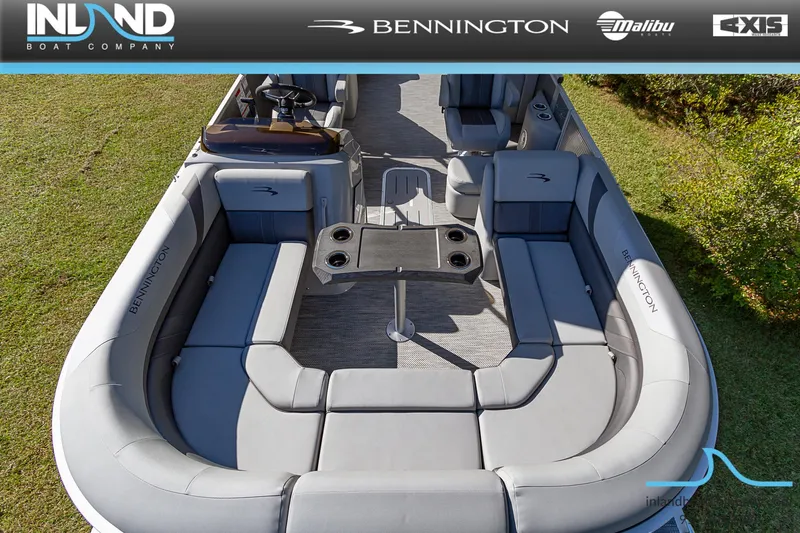 Slide: The Image of 2023 Bennington 22 SXSR pontoon boat with spacious seating and table. - 17