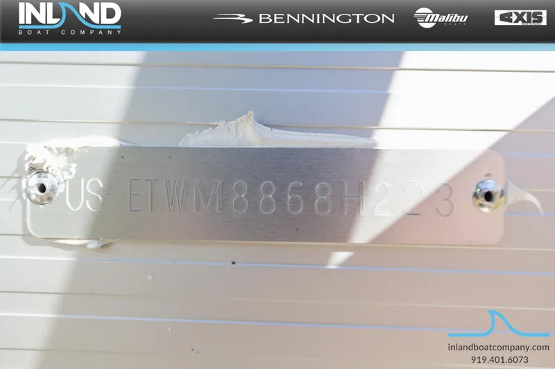 Slide: The Image of 2023 Bennington 22 SXSR boat identification plate with Inland Boat Company branding. - 20