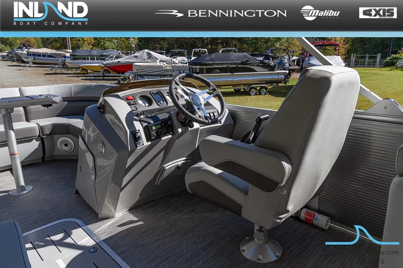 Slide: The Image of 2023 Bennington 22 SXSR boat interior with captain's chair and control panel. - 9