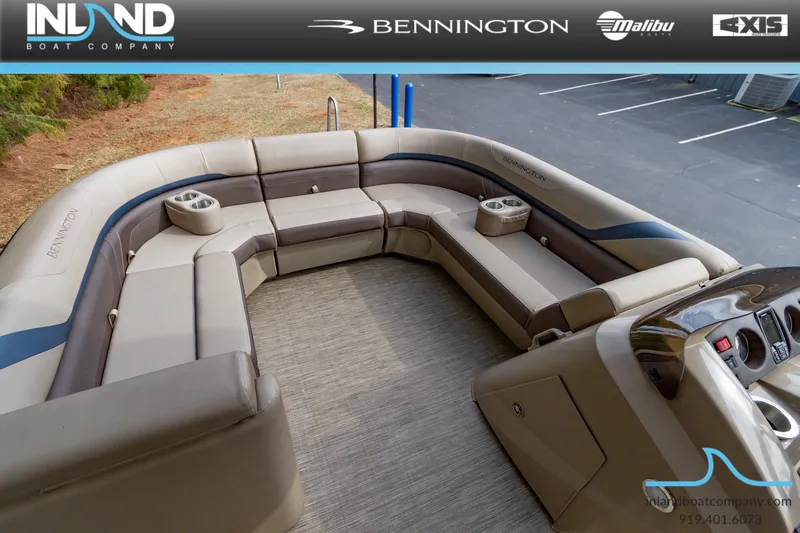 Slide: The Image of 2023 Bennington 22 SXSB pontoon boat interior with plush seating and cup holders. - 15