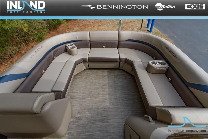 Slide: The Image of 2023 Bennington 22 SXSB boat interior with spacious seating and cup holders. - 16