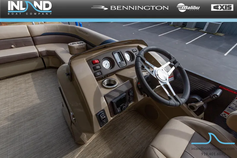 Slide: The Image of 2023 Bennington 22 SXSB boat interior with steering wheel and control panel. - 18