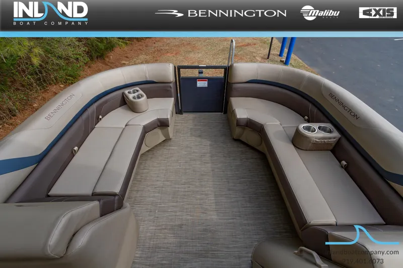 Slide: The Image of 2023 Bennington 22 SXSB pontoon boat interior with spacious seating and cup holders. - 20