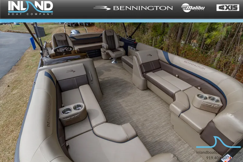 Slide: The Image of 2023 Bennington 22 SXSB pontoon boat with spacious seating and modern interior design. - 22
