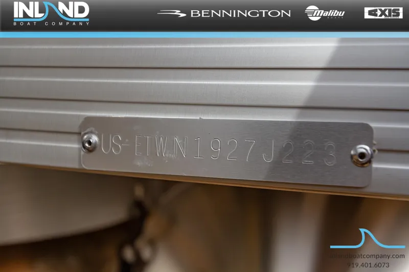 Slide: The Image of 2023 Bennington 22 SXSB boat identification plate with Inland Boat Company branding. - 27